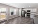 Bright kitchen featuring stainless steel appliances, white cabinets, and modern finishes at 310 Ashigan St, Union City, GA 30291