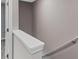 Clean staircase design with white trim and neutral paint at 310 Ashigan St, Union City, GA 30291