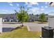 View of property exteriors featuring grassy area and sidewalk at 310 Ashigan St, Union City, GA 30291