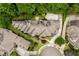 Breathtaking aerial view of an estate showcasing its sprawling layout, landscaped grounds, and private setting at 5119 Greythorne Ln, Marietta, GA 30068