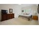 Spacious bedroom with neutral carpet and furnishings, and bright natural light at 5119 Greythorne Ln, Marietta, GA 30068