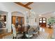 Dining room featuring hardwood floors, a chandelier, and a built-in hutch at 5119 Greythorne Ln, Marietta, GA 30068