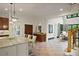 Open kitchen with granite countertops, a large island, and stainless appliances at 5119 Greythorne Ln, Marietta, GA 30068