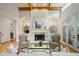 Living room featuring a fireplace, hardwood floors, and matching chairs at 5119 Greythorne Ln, Marietta, GA 30068
