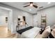 Cozy bedroom featuring hardwood floors, neutral walls, ceiling fan and minimal decor at 1377 Dorothy Dr, Decatur, GA 30030