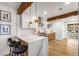 Modern kitchen featuring stainless steel appliances, granite countertops, and an island with seating at 1377 Dorothy Dr, Decatur, GA 30030