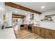 Modern kitchen with stainless steel appliances, wooden accents, white cabinetry and hardwood flooring at 1377 Dorothy Dr, Decatur, GA 30030