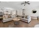 Cozy living area with hardwood floors that flows into a spacious kitchen at 2237 Foley Park St, Snellville, GA 30078