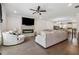 Open concept living room with fireplace and backyard access at 2237 Foley Park St, Snellville, GA 30078