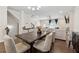 Bright and airy living room open to the dining area at 2237 Foley Park St, Snellville, GA 30078