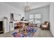 Bright craft room featuring a large table, ample storage, and natural light, perfect for hobbies and creative projects at 5320 Coltman Dr, Cumming, GA 30028