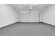Spacious two car garage with epoxy flooring at 5320 Coltman Dr, Cumming, GA 30028