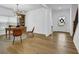 Home office with a vintage desk, hardwood floors, a large window and natural light at 5320 Coltman Dr, Cumming, GA 30028