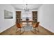 Inviting home office featuring a stylish desk, hardwood floors, and ample storage, perfect for productivity at 5320 Coltman Dr, Cumming, GA 30028