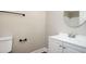 This bathroom features a neutral color scheme with updated fixtures and design at 5474 Post Road Pass, Stone Mountain, GA 30088