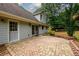 Home featuring backyard patio and garden with mature trees and privacy fence at 60 Valley Rd, Covington, GA 30016