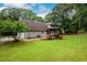 Spacious backyard features a gazebo and an expansive lawn perfect for entertaining and outdoor activities at 60 Valley Rd, Covington, GA 30016