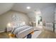Bright bedroom featuring a skylight, neutral walls, plush carpet, and a dedicated study area at 60 Valley Rd, Covington, GA 30016