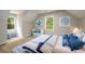Charming bedroom featuring nautical decor, natural light, and a cozy, carpeted floor at 60 Valley Rd, Covington, GA 30016