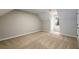 Bright bedroom featuring natural light, neutral walls, plush carpet, and ample space at 60 Valley Rd, Covington, GA 30016