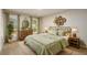 Cozy bedroom featuring two windows, carpet, and decorative furnishings at 60 Valley Rd, Covington, GA 30016
