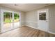 Bright dining area with access to the backyard through double glass doors at 60 Valley Rd, Covington, GA 30016