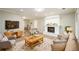 Cozy living room featuring stylish furniture, a fireplace, and an open layout, perfect for relaxation at 60 Valley Rd, Covington, GA 30016