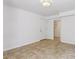 Finished basement featuring tile floors, recessed lighting, and a doorway at 1072 Piedmont Ne Ave # 101, Atlanta, GA 30309