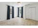 Spacious bedroom with tile floors, ample natural light, and a closet at 1072 Piedmont Ne Ave # 101, Atlanta, GA 30309
