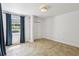 Bright bedroom with tile floors and large windows featuring stylish curtains at 1072 Piedmont Ne Ave # 101, Atlanta, GA 30309