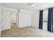 Spacious bedroom with tile floors and a view to a tiled bathroom at 1072 Piedmont Ne Ave # 101, Atlanta, GA 30309