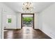 Open layout featuring hardwood floors, lots of light and a view to an outdoor space at 1072 Piedmont Ne Ave # 101, Atlanta, GA 30309