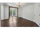 Inviting living room featuring wood floors, light walls, and classic design elements at 1072 Piedmont Ne Ave # 101, Atlanta, GA 30309