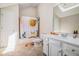 Cozy bathroom with single sink vanity and tub with patterned shower curtain at 1600 Heritage Trl, Roswell, GA 30075