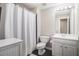 Simple bathroom with white fixtures and a shower-tub combination at 1600 Heritage Trl, Roswell, GA 30075