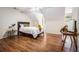 Bedroom featuring hardwood floors, bright windows and neutral walls at 1600 Heritage Trl, Roswell, GA 30075