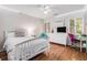 Comfortable bedroom with hardwood floors and lots of natural light at 1600 Heritage Trl, Roswell, GA 30075
