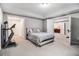 Cozy bedroom with neutral colors and lots of open space at 1600 Heritage Trl, Roswell, GA 30075