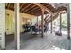Outdoor deck with grill, seating, and stairs leading to upper deck at 1600 Heritage Trl, Roswell, GA 30075