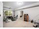 Home gym featuring various exercise machines, offering a convenient fitness space at 1600 Heritage Trl, Roswell, GA 30075
