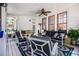 Inviting sunroom furnished with comfortable seating, perfect for relaxation and entertaining at 1600 Heritage Trl, Roswell, GA 30075