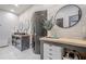 Spacious bathroom features dual sinks, vanity, and shiplap accent wall at 188 Cooper Creek Dr, Dallas, GA 30157