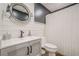 Basement bathroom featuring updated fixtures, shiplap walls, and modern finishes at 188 Cooper Creek Dr, Dallas, GA 30157