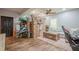 Bright basement living room with cozy seating, wood-look floors, and a ceiling fan at 188 Cooper Creek Dr, Dallas, GA 30157