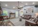 Cozy living room featuring a stone fireplace, vaulted ceilings, and comfortable seating, perfect for relaxation at 188 Cooper Creek Dr, Dallas, GA 30157