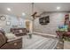 Inviting living room with vaulted ceilings, a feature wall, and comfortable seating, ideal for entertaining at 188 Cooper Creek Dr, Dallas, GA 30157