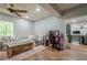 Open basement living room area featuring neutral paint, and wood-look floors at 188 Cooper Creek Dr, Dallas, GA 30157