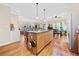 A spacious kitchen featuring stainless steel appliances, and an island with bar stool seating at 4649 Dahlia Dr, Pine Lake, GA 30072