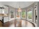 Cozy breakfast nook with chandelier and views of the backyard at 7059 Hunters Rdg, Woodstock, GA 30189
