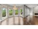 Open-concept living room flows from the kitchen to the living area and outside deck at 7059 Hunters Rdg, Woodstock, GA 30189